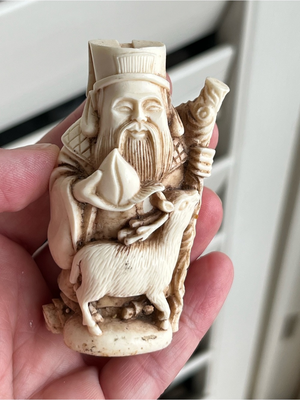 Ivory-Tone Figurine of Bearded Man with Deer - Home Accent